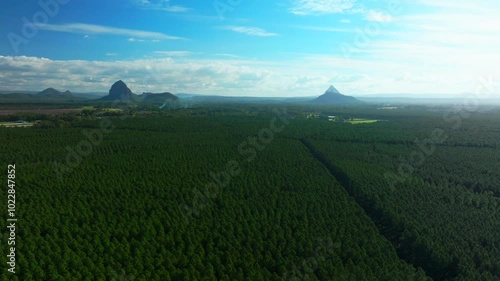 Glass House Mountains Sunshine Coast Queensland QLD Australia aerial drone blue sky sunny clouds Lutton Beerburrum Peachester State bush forest Gum Eucalyptus Para Rubber Trees smoke circle left photo