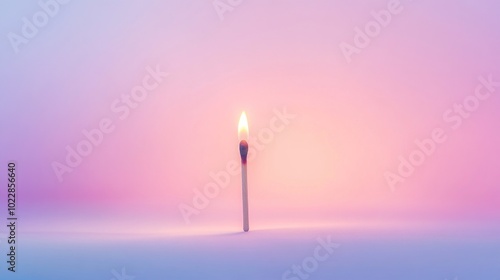 A Single Lit Matchstick in a Pink and Purple Gradient