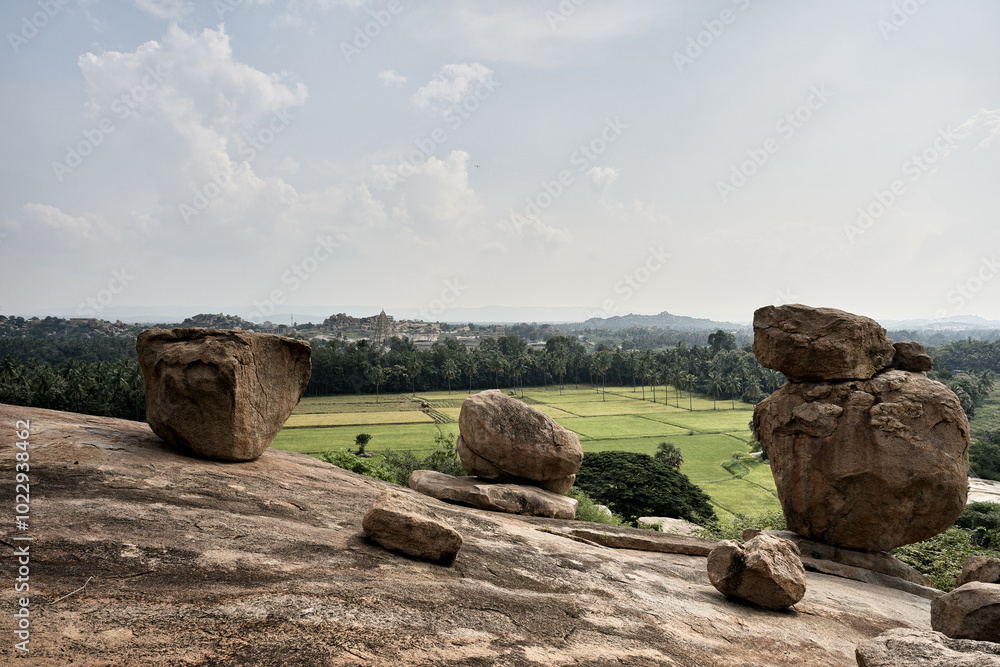 Granite giants watching over the rice fields of Anegundi