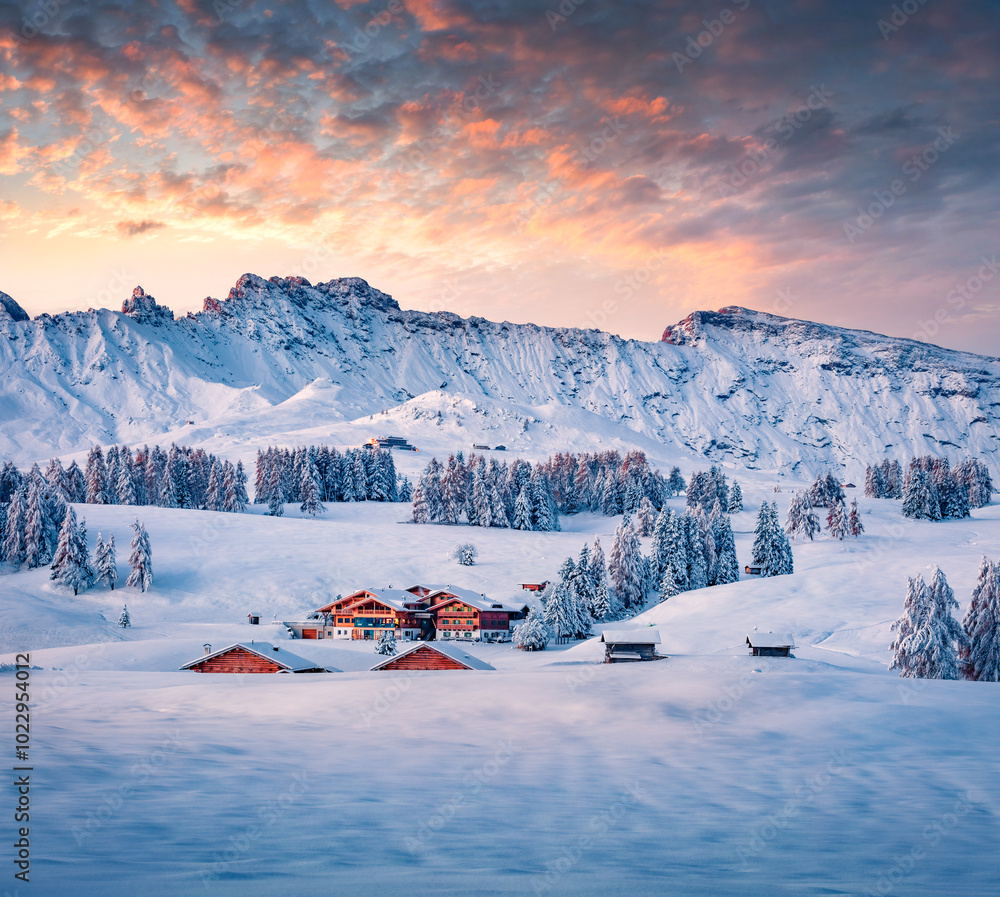Untouched winter landscape. Amazing morning view of Alpe di Siusi village. Cold winter scene of Dolomite Alps. Popular ski resort in Ityaly, Europe at December. Traveling concept background.