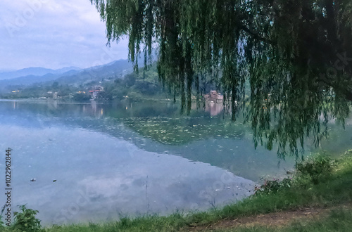 Mountainous landscape of Phewa tal lake in Pokhara Nepal photo