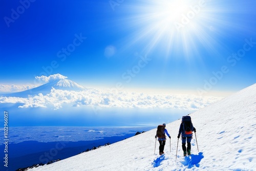 A snowstorm has two girls walking through the snow with snowshoes and backpacks.