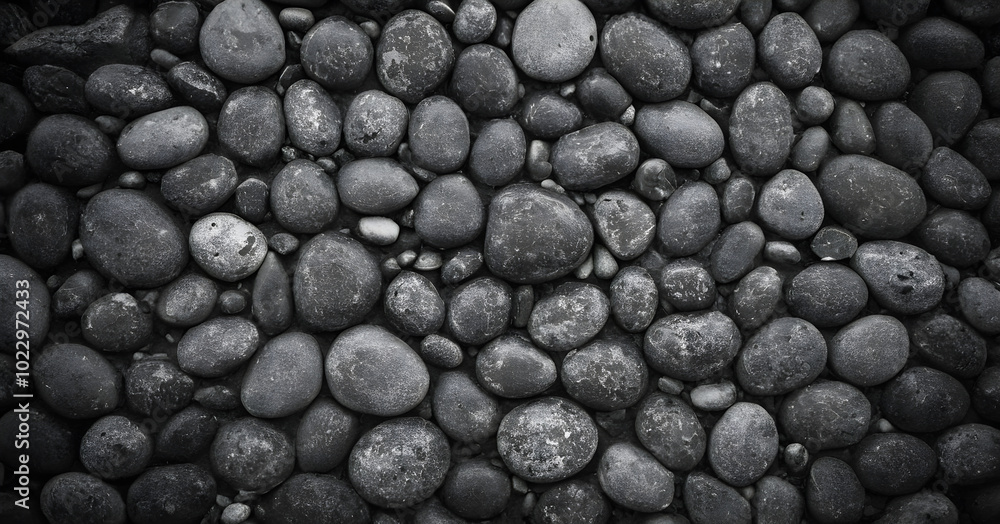 Monochromatic floor is forming by grey pebbles Monochromatic floor is forming by grey pebbles