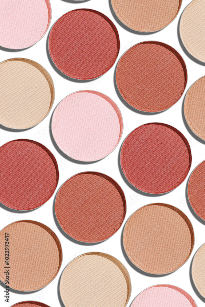Fototapeta premium Eyeshadow palette, mix of matte shades in neutral beige brown hues. Minimal view pattern for beauty, makeup, cosmetic themes, Vivid nude skintone colored swatches eyeshade refills round shape