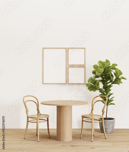 a wooden table and two chairs with a plant in the corner and frame on the wall for decor
