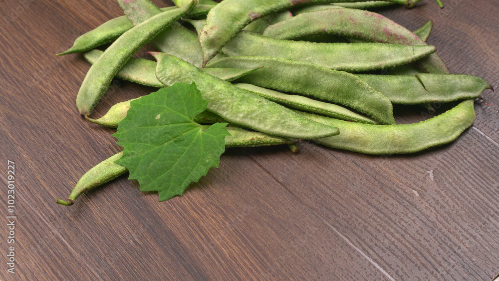 Pile of green beans over wooden background, Healthy food concept Pile of green beans over wooden background, Healthy food concept