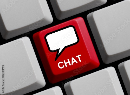 Chat online - Sprechblase auf Tastatur photo