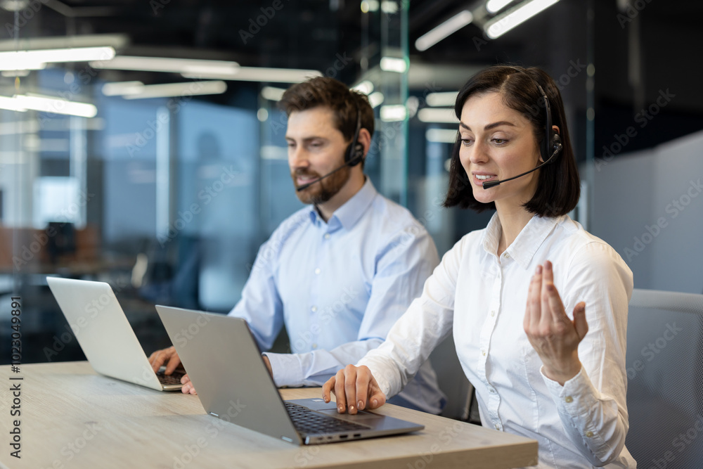 Customer service agents in office using laptops and headsets, demonstrating teamwork and communication. Professionals engaged in support tasks, focused on client satisfaction and technology-driven Customer service agents in office using laptops and headsets, demonstrating teamwork and communication. Professionals engaged in support tasks, focused on client satisfaction and technology-driven