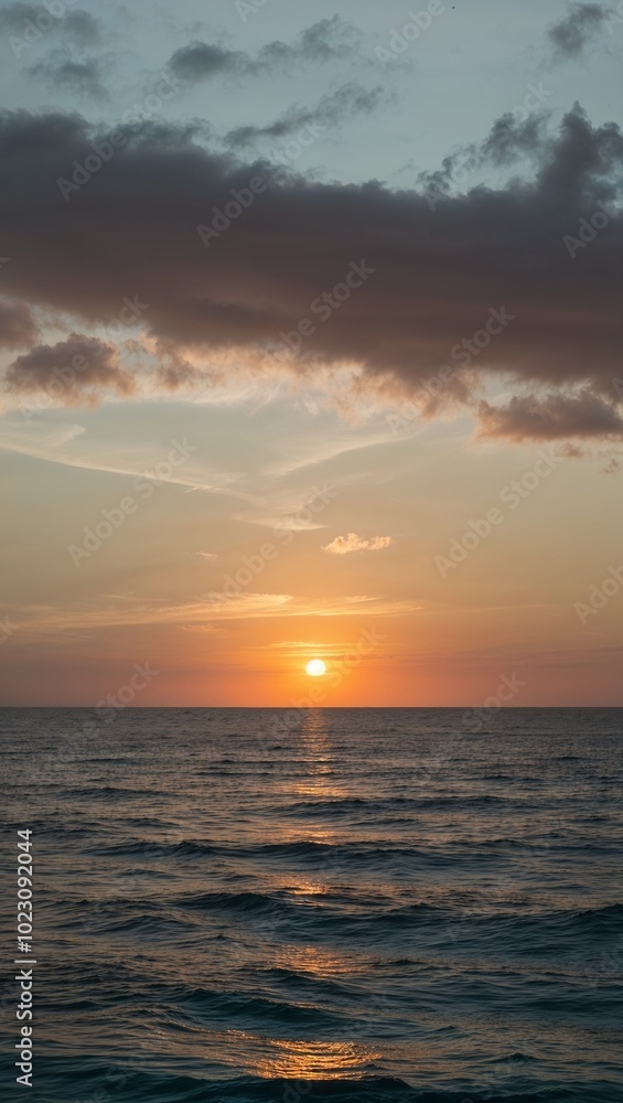Sunset sky over tranquil ocean waves background for invitation or card screensaver Sunset sky over tranquil ocean waves background for invitation or card screensaver