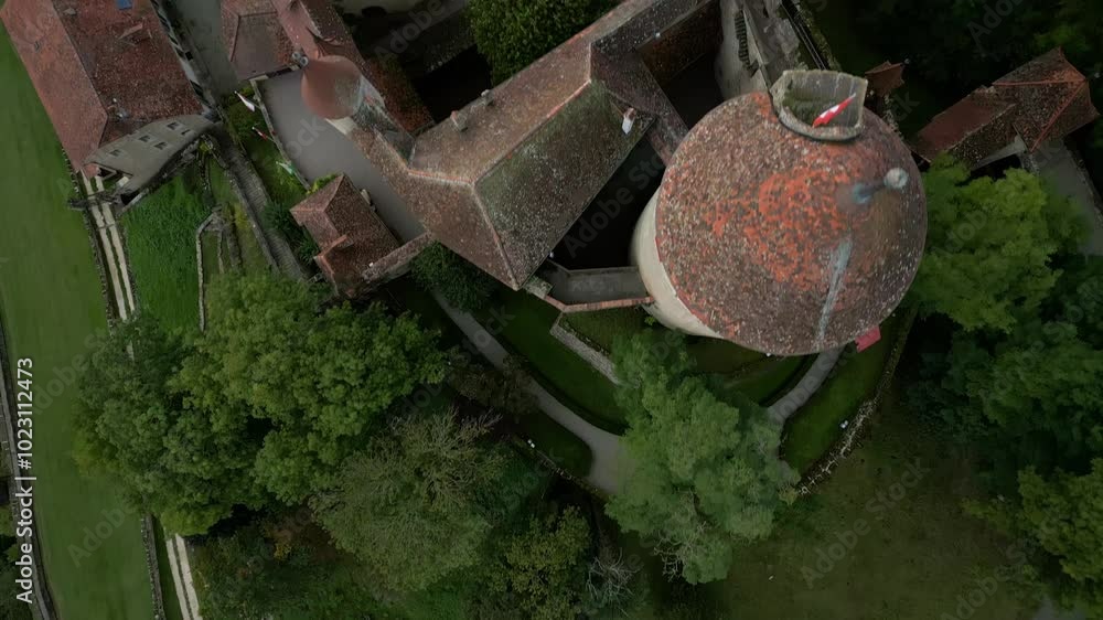 Bird's eye view drone shot of beautiful Lucens Castle in Vaud Switzerland Bird's eye view drone shot of beautiful Lucens Castle in Vaud Switzerland