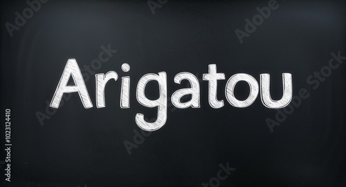 arigatou text lettering on blackboard chalkboard background