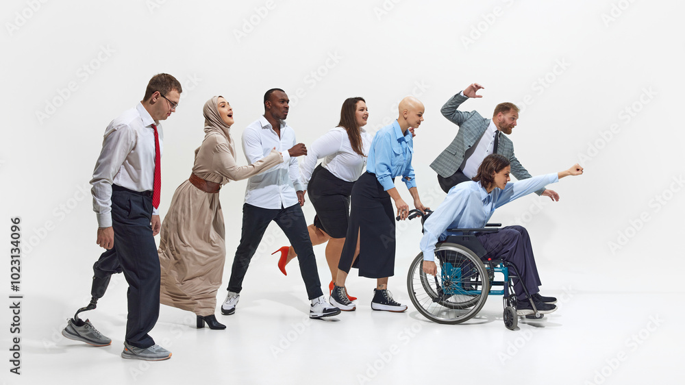 Obraz premium Diverse group of professionals in motion, moving forward, dynamic team-building exercise, symbolizing unity, motivation and collective effort workplace. Concept of business, dei, equality, support