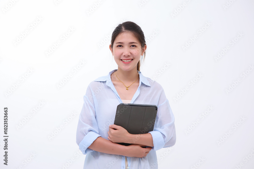 Beautiful Asian woman using tablet portable device computer technology, feeling happy smiling formal wear, internet connectivity and digital creative design tool. With white blank background. Beautiful Asian woman using tablet portable device computer technology, feeling happy smiling formal wear, internet connectivity and digital creative design tool. With white blank background.