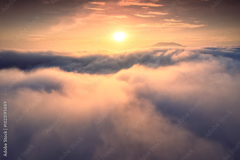 Sunrise shines over sea of fog in the morning Sunrise shines over sea of fog in the morning