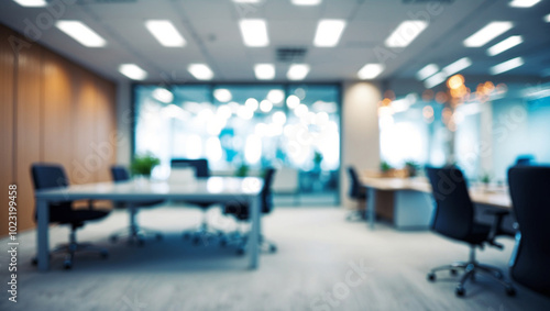 Blurred image of modern office interior with bokeh lights.