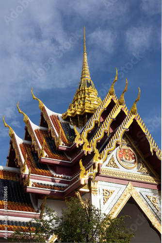 Wallpaper Mural Reach for the sky.  Ornate Bangkok temple roof against a blue sky. Torontodigital.ca