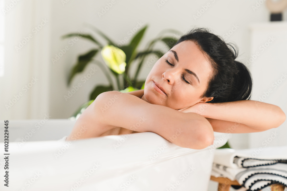 Close up shot of mature caucasian woman relaxing resting in bathroom, taking serene bath after work day. Spa beautification concept Close up shot of mature caucasian woman relaxing resting in bathroom, taking serene bath after work day. Spa beautification concept