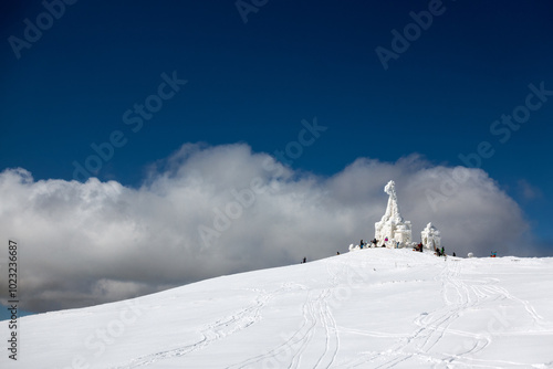 The chapel of Saints Peter and Paul on top of Kaimaktsalan mountain, covered with ice and snow, where a great battle took place in WWI between Serbian and Bulgarian troops photo