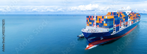 Photography Front view of Cargo container ship carrying container and running out international container port customs shipyard sea port concept smart logistic service