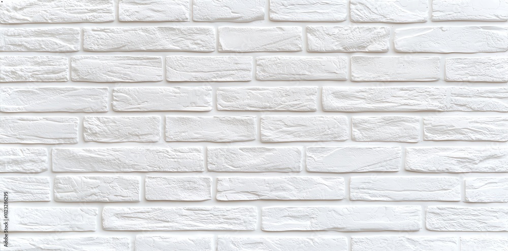 Fototapeta premium A clean, textured white brick wall, perfect for background use in various design and photography projects.