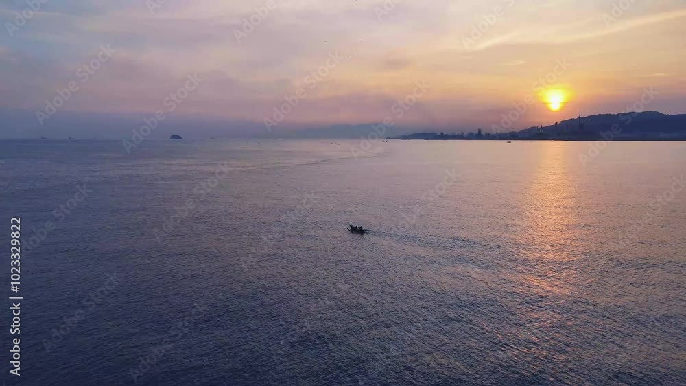 Aerial view of tropical beach and island at sunset, anyer beach west java, indonesia Aerial view of tropical beach and island at sunset, anyer beach west java, indonesia