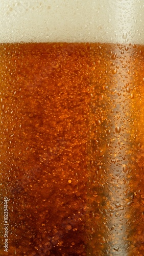 Close-up of beer pouring in...