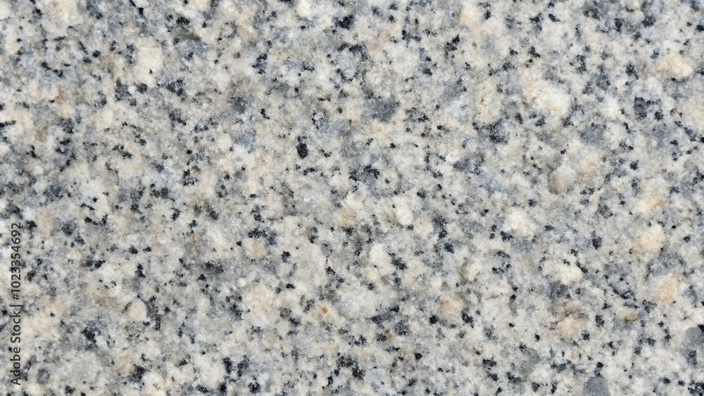 Granite background texture with seamless repeating pattern on tilted angle Granite background texture with seamless repeating pattern on tilted angle