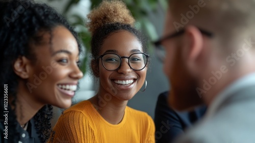 Group of diverse business professionals smiling and collaborating during a meeting. Suitable for teamwork, corporate success, and leadership topics.