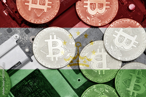 flag of tajikistan on the bitcoins with computer electronic circuit board background. bitcoin concept. photo