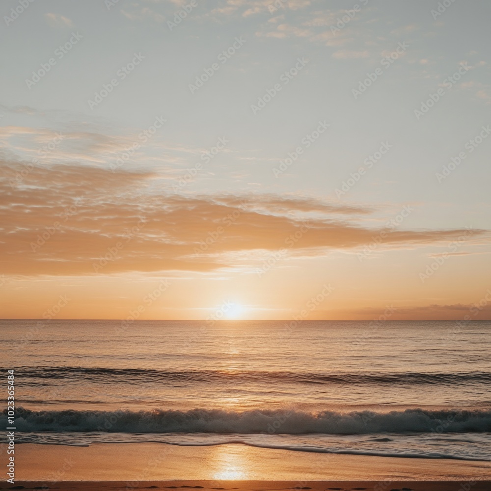 Stunning sunset view over a calm beach with golden skies and gentle waves. Ideal for travel, vacation, or relaxation themes. Stunning sunset view over a calm beach with golden skies and gentle waves. Ideal for travel, vacation, or relaxation themes.