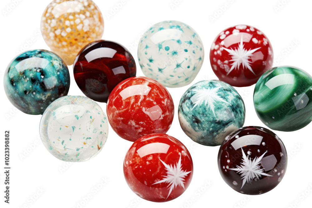 Close-up view of several Christmas marbles with festive patterns such as snowflakes and stars, arranged neatly on a smooth white background. Close-up view of several Christmas marbles with festive patterns such as snowflakes and stars, arranged neatly on a smooth white background.