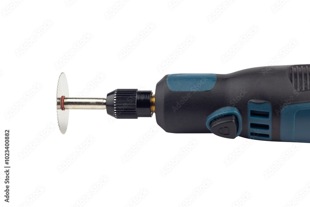 hand engraver with saw blade, mini hand drill on battery isolated from background hand engraver with saw blade, mini hand drill on battery isolated from background