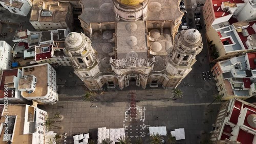Drone flight over the cathedral of Cadiz, Andalucia, Spain. Vertical panorama discovering the sea