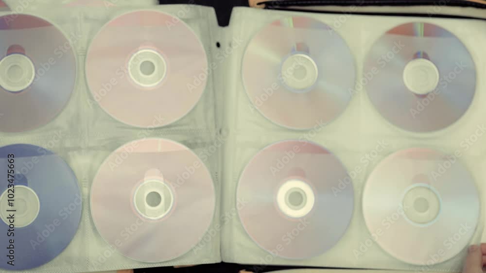 Close up of cd discs in a holder. Disc with data,movie or music.