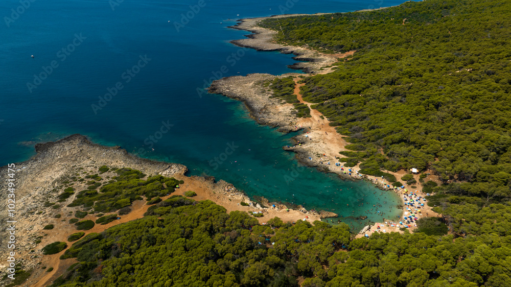 Aerial view of the beach in the Porto Selvaggio Regional Natural Park in Salento. It is a protected natural area of Puglia located in the province of Lecce, Italy. Aerial view of the beach in the Porto Selvaggio Regional Natural Park in Salento. It is a protected natural area of Puglia located in the province of Lecce, Italy.