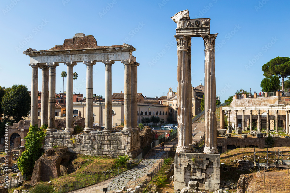 View of the ruins of the Roman Forum with the temple of Saturn and the temple of Vespasian and Titus. Rome, Italy