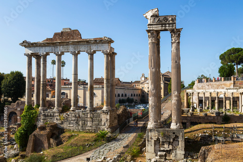Obraz na płótnie View of the ruins of the Roman Forum with the temple of Saturn and the temple of Vespasian and Titus. Rome, Italy w salonie