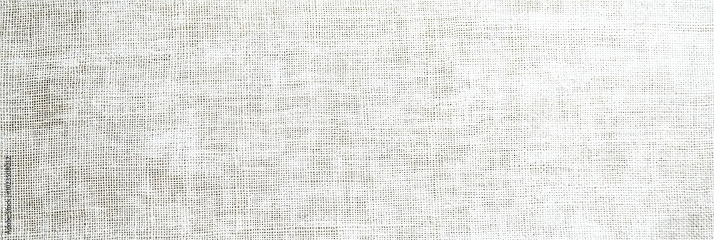 A textured light fabric serves as an elegant backdrop, perfect for showcasing design work, fashion items, or creating a soft ambiance in decor A textured light fabric serves as an elegant backdrop, perfect for showcasing design work, fashion items, or creating a soft ambiance in decor