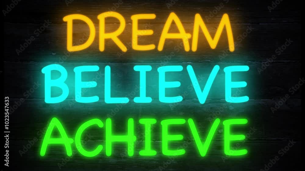 dream, believe, achieve neon effect sign on a dark wooden background dream, believe, achieve neon effect sign on a dark wooden background
