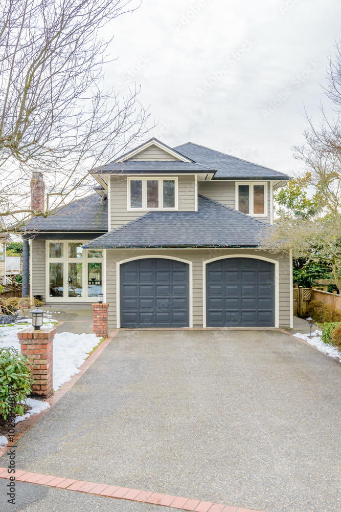 luxury house with big tree and nice landscape at winter in Vancouver, Canada luxury house with big tree and nice landscape at winter in Vancouver, Canada