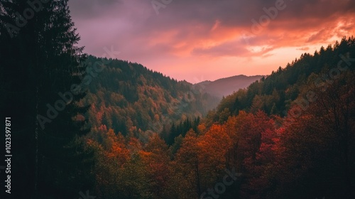 Twilight sky over a tranquil autumn mountain with vibrant foliage in warm tones during a peaceful evening glow