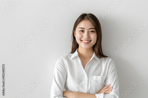 Oriental woman smiling on white background