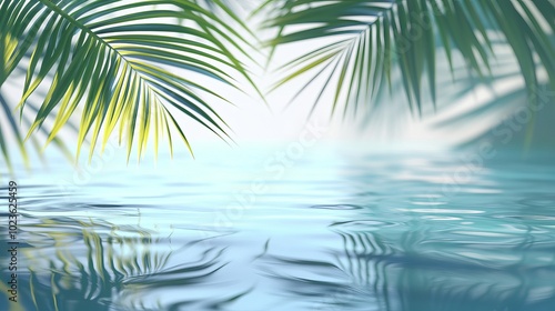 Palm leaves hanging over the water reflecting the tropical landscape.