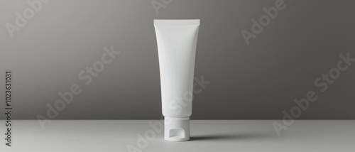 Minimalist White Cream Tube on Gray Surface - Clean Cosmetic Product Presentation for Branding and Advertising