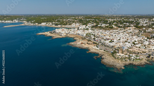 Aerial view of Santa Maria al Bagno, hamlet of the municipality of Nardò in Salento, Puglia, Italy. It's a small tourist town famous for its four columns on the sea, ruins of an ancient fortification.