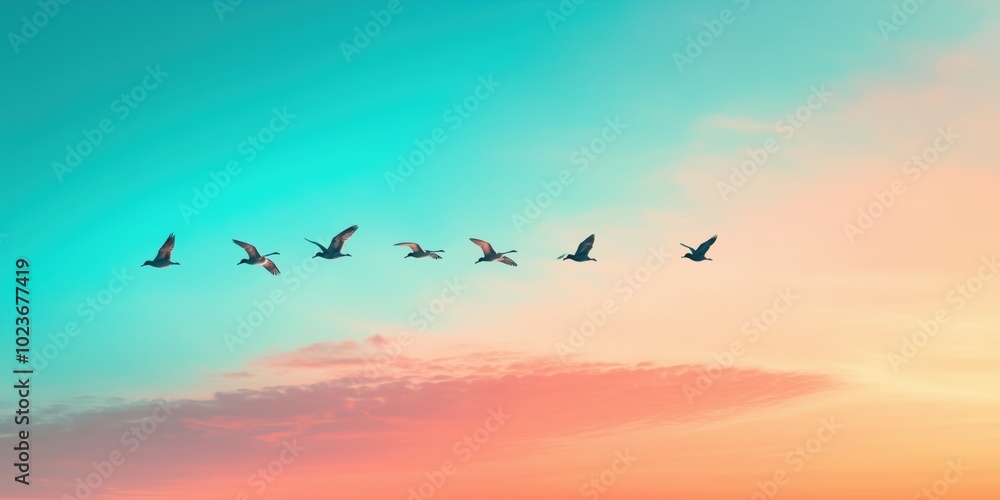 Fototapeta premium Captivating Flock of Birds in V-Formation: Majestic Avian Flight Patterns at Dusk Against a Tranquil Sky