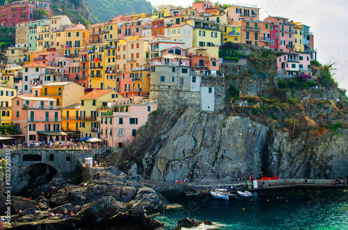 Cinque Terre, Liguria, Italy - August 5th 2024: View of the colorful houses of Cinque Terre photo