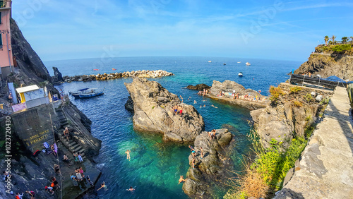 Cinque Terre, Liguria, Italy - August 5th 2024: View of the sea and rocks in Cinque Terre photo