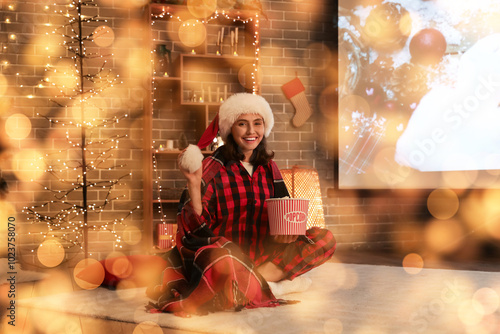 Young woman with popcorn wa...