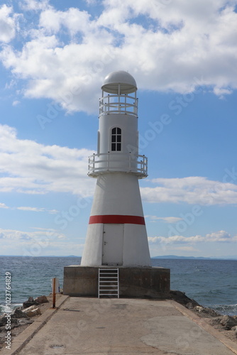 lighthouse on the coast of the sea